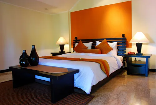 Interesting ideas for orange two colour combination for bedroom walls