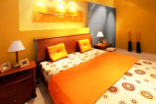 Interesting ideas for orange two colour combination for bedroom walls