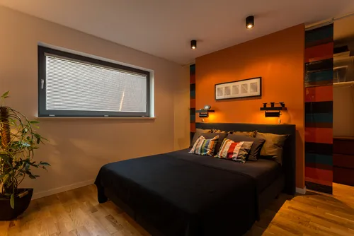 Interesting ideas for orange two colour combination for bedroom walls