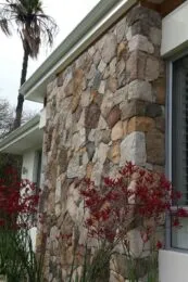 Natural stone exterior wall