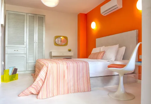 Interesting ideas for orange two colour combination for bedroom walls